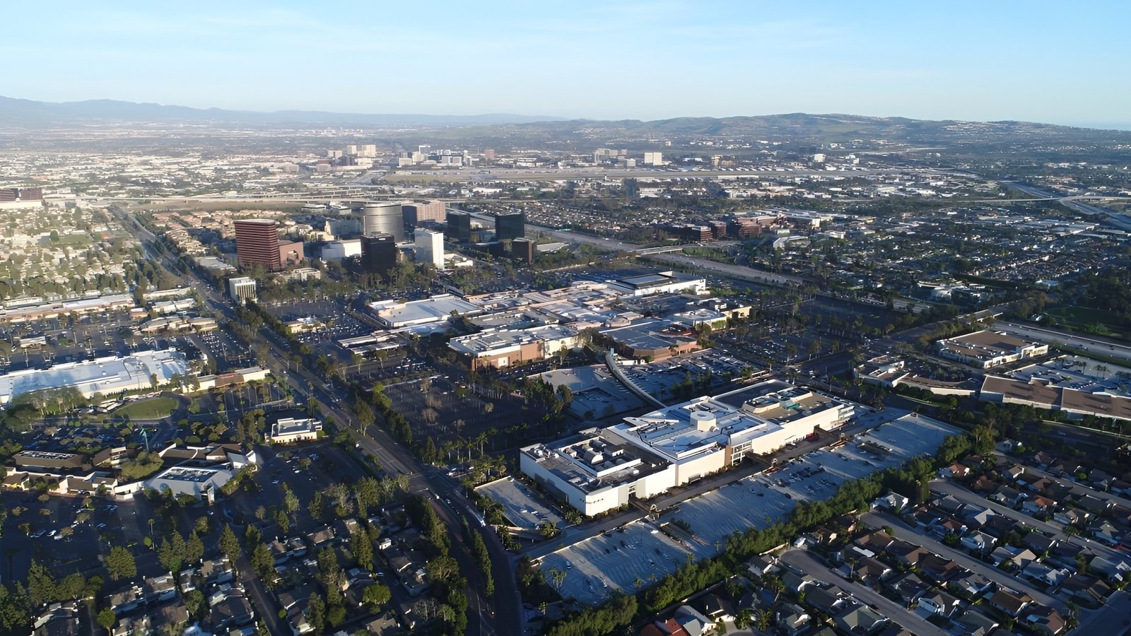 Aerial view of city neighborhood and streets.