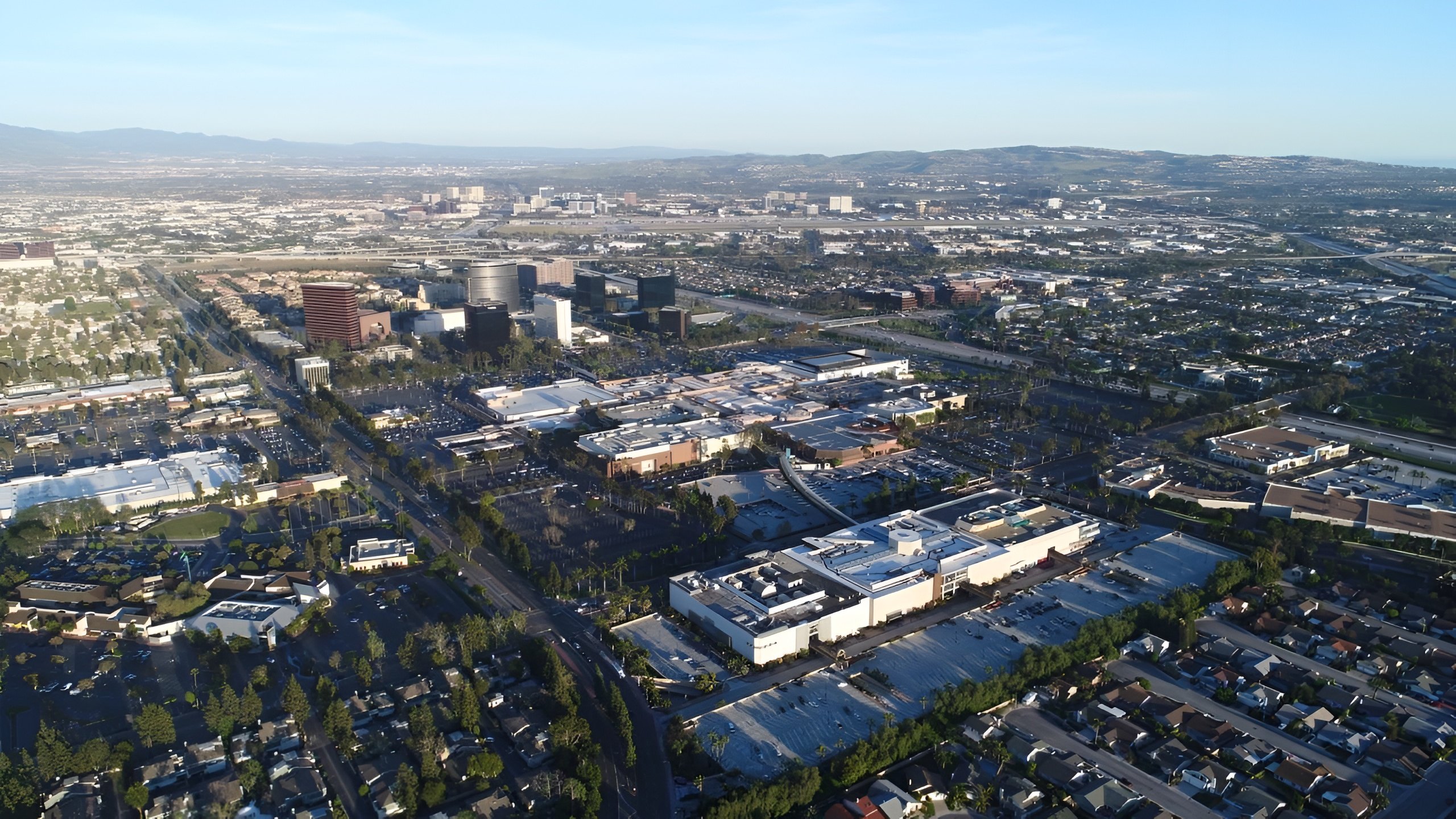 Aerial view of city neighborhood and streets.