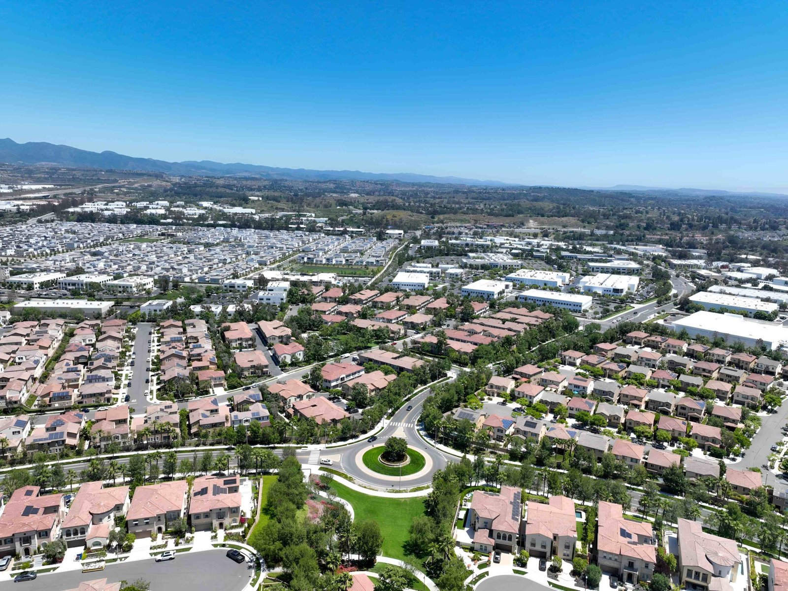 Aerial view of suburban homes and roads.
