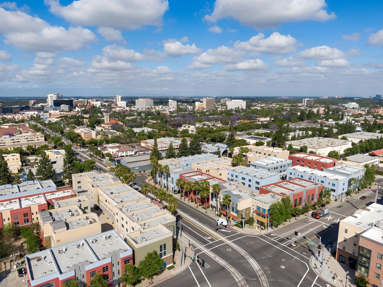 Aerial view of city buildings and roads.
