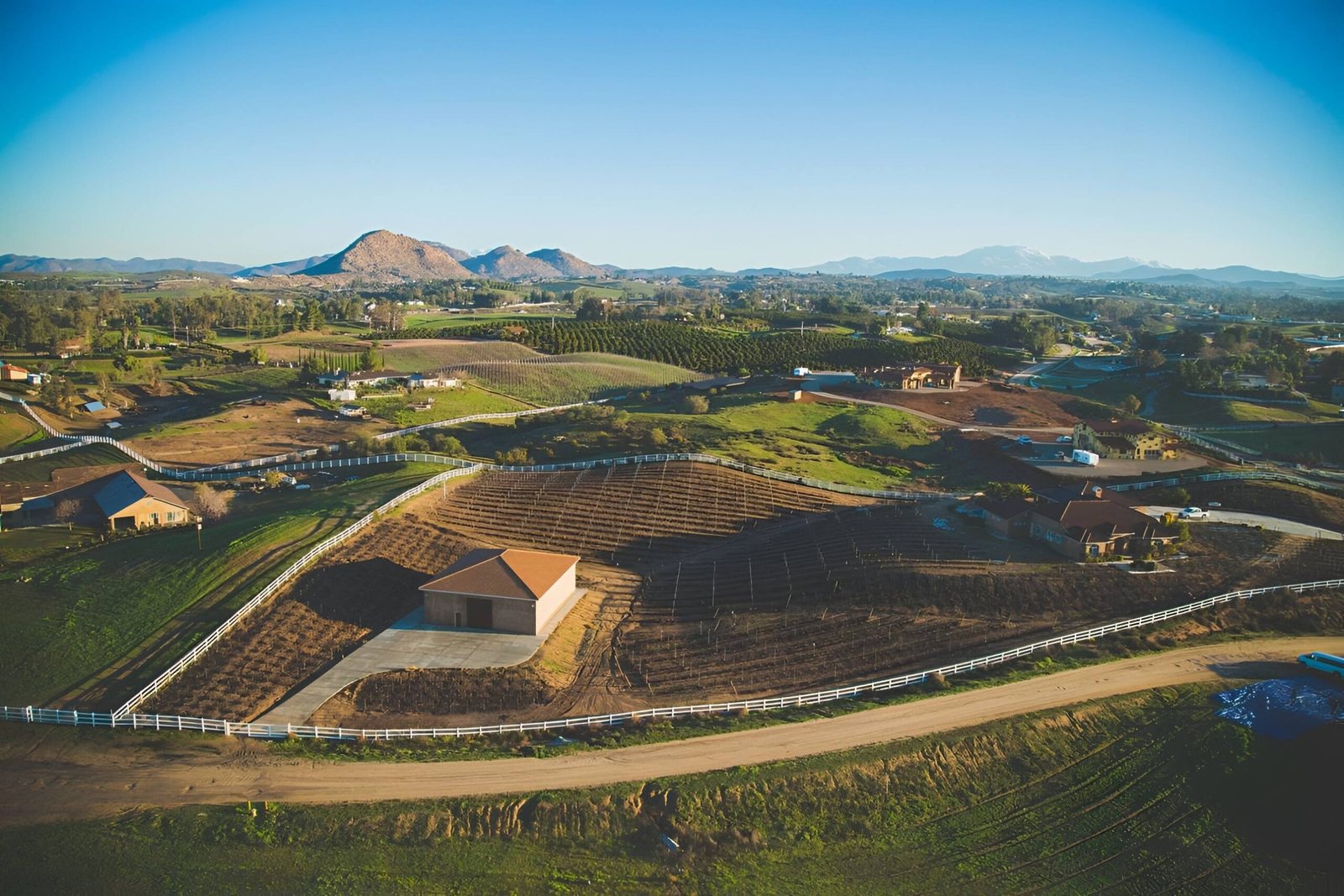 Aerial view of farmland and open fields.